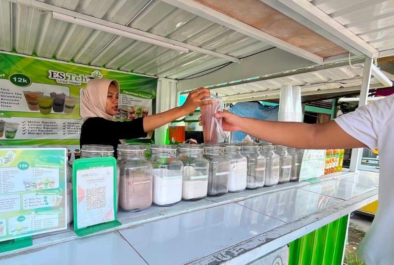 Salah satu UMKM yang menggunakan Qris. (Foto: Nur Hidayah/Pusaranmedia.com)