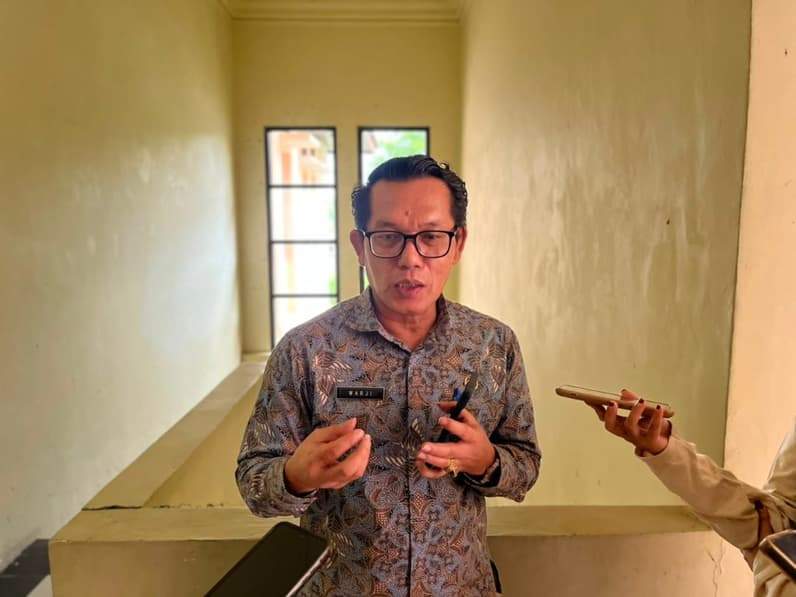 Plt Kepala DPPKBP3A Berau, Warji. (Foto: Nur Hidayah/ pusaranmedia.com)