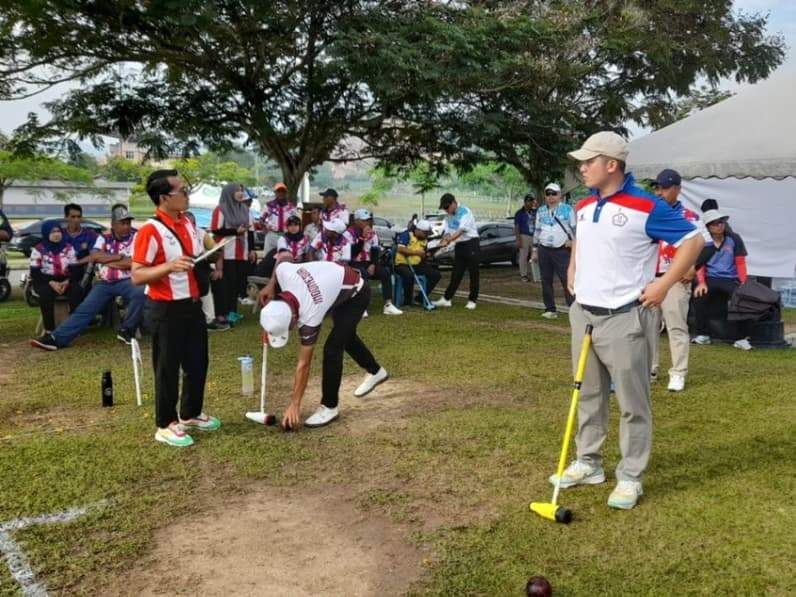 Muhammad Jamil menjadi wasit pertandingan final World Cup Woodball di UniMAP Malaysia. (Foto: Dok.Jamil)